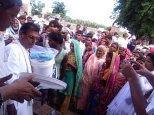 6b.Distributing relief materials to flood victims at Kapilvastu 