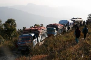 The line of Trucks carrying relief package in the narrow hiily roads